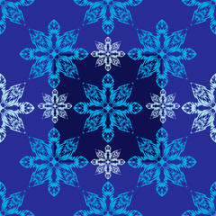 Vector seamless pattern of snowflakes on a blue background for decorating  Christmas and New Year holidays