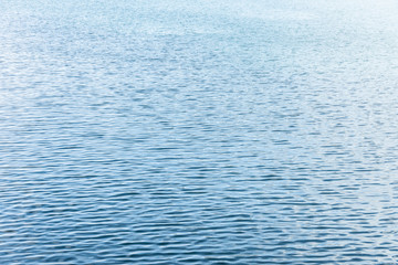 Ripple Water in swimming pool with sun reflection