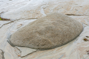 Fototapeta na wymiar Hintergrundbild eines Sandstrands bei Ebbe
