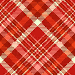 Seamless plaid pattern in shades of red, pink and yellow.