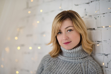 Candid female portrait in christmas atmosphere