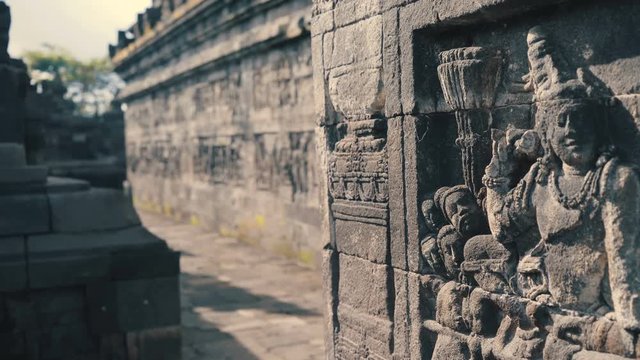 Bas reliefs on wall of Borobudur temple in Java, Indonesia