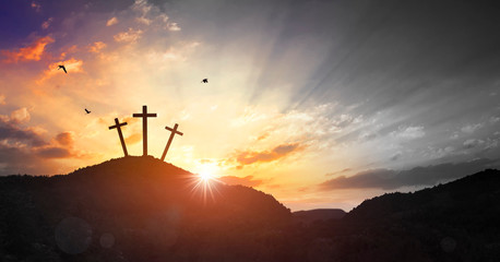 Christmas concept: Crucifixion Of Jesus Christ Cross At Sunset