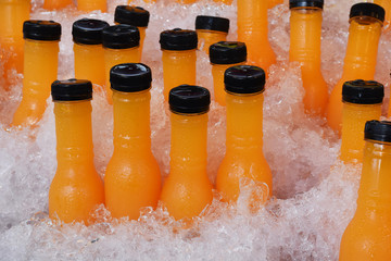 fresh orange juice in ice basket, sweet and tasty