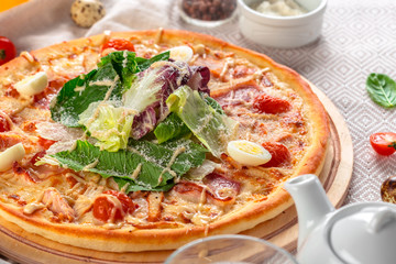 Delicious fresh pizza served on wooden table