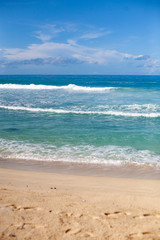 Landscape photo of beautiful white sand exotic beach on Mahe island in Seychelles
