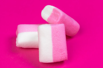 marshmallows on a pink background. top view