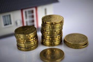 An Image of a money, house