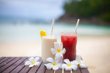 Two coctails on the tropical beach on Seychelles.