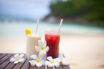 Two coctails on the tropical beach on Seychelles.
