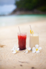 Two coctails on the tropical beach on Seychelles.