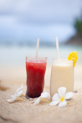 Two coctails on the tropical beach on Seychelles.
