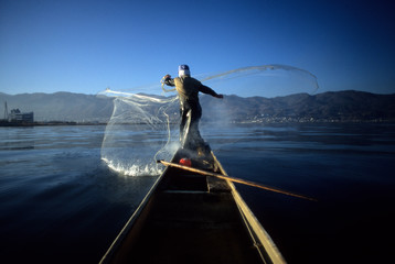 Fisherman casting net
