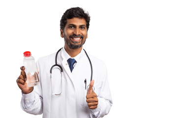 Doctor holding water bottle with thumb up.