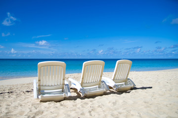 Chaise Lounges on a Sandy Beach