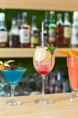 bar counter Cocktails drinks selection multicolored summer drinks
