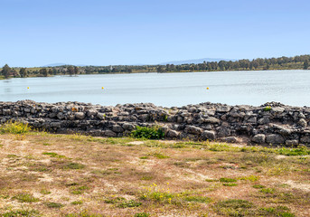 Guadiana river next to the fields of Extremadura on a sunny day