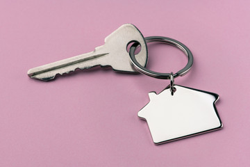 house keys on a pink background