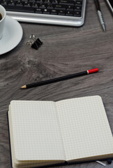 Business objects on a wood desk.