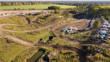 Aerial view of the motocross track on which the race is going with viewers