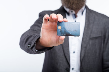 credit card online transactions and banking. money management and finances. man holding plastic card.