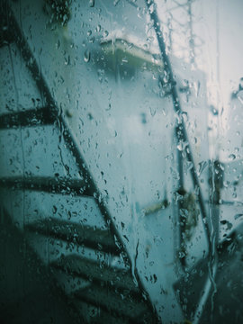 Blurry view out of the ship's wet window.