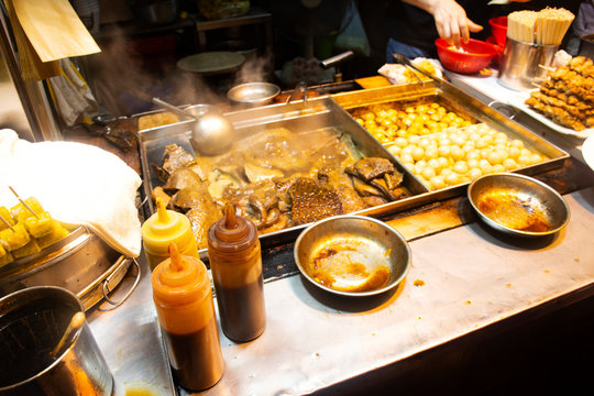 Organs boiling with meatball in spicy and sweet brown sauce and dim sum of Street Food of Hong Kong, China