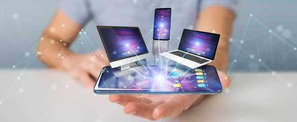 Modern devices connected in businessman hand 3D rendering