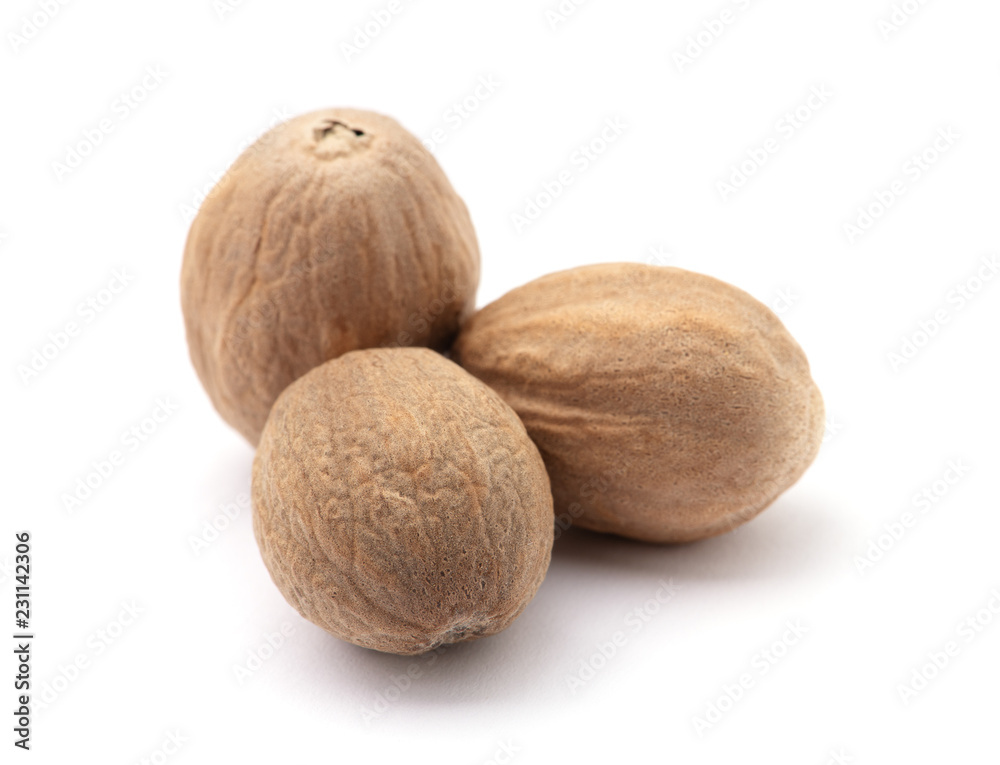 Wall mural nutmeg isolated on white background