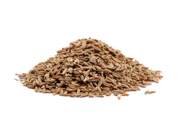 Pile of cumin seeds isolated on white background