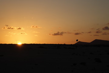 Low sun over the Natural park in Corralejo Fuerteventura in the Canary Islands