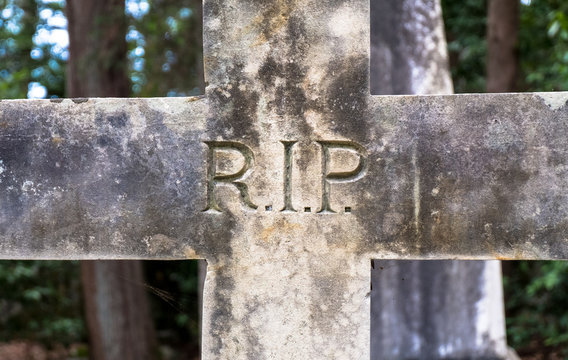 Tombstone in a cemetery, rest in peace written