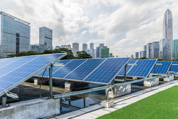 Solar and modern city skyline 