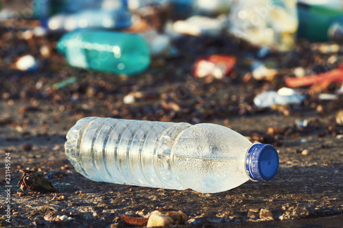 Spilled Seaport Garbage By The Sea Of A Big City Empty Used - 
