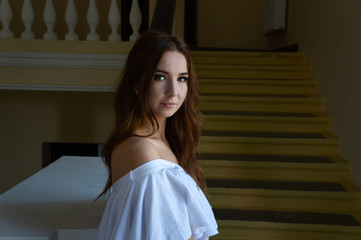 Girl portrait dressed in white dress.