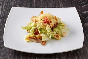 Fruit and vegetable salad with meat. Side view.