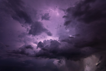 Lightning and rain clouds at night