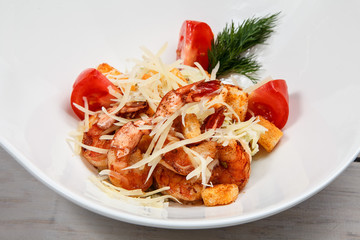 Caesar salad with king prawns