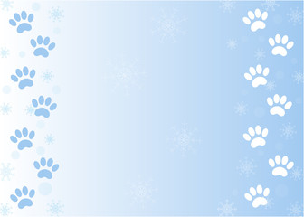 Winter paw prints of Pets on snow blue background frame with copy space for your text.