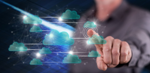 Man touching a cloud networking concept