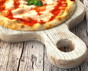 Pizza margherita and wooden old cutting board