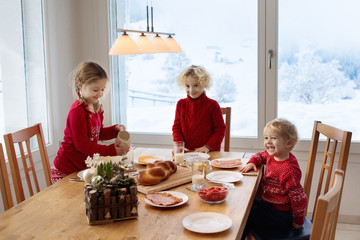 Kids breakfast in winter. Christmas meal at home.