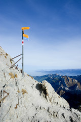 hiking sign on top of mountain on säntis switzerland swiss alps