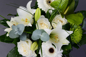 bouquet bunch of beautiful white flowers with white roses, lily and daisy