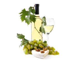 Glass and bottle of wine with cheese and ripe grapes on white background