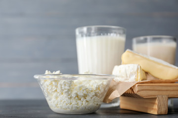 Different milk products on wooden table