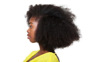 Close up profile portrait of attractive young black woman with afro hair
