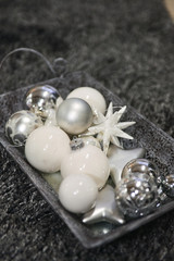 Christmas decor for table setting, or wedding decor, studio with a Christmas tree. Christmas decorations toys, candles, fir branches