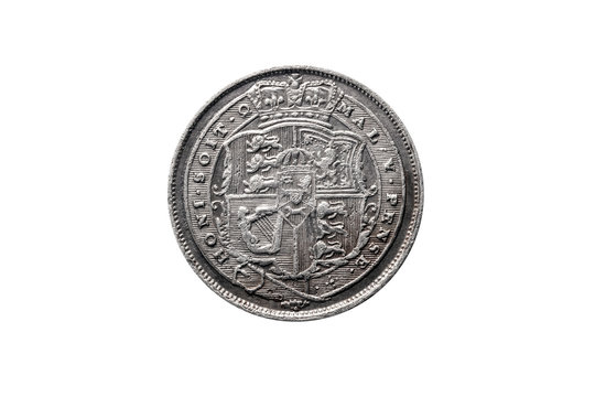 Old pre decimal 1819 George III silver sixpence coin reverse showing the arms of the UK cut out and isolated on a white background