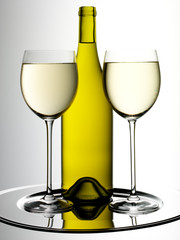 WHITE WINE GLASS AND BOTTLE